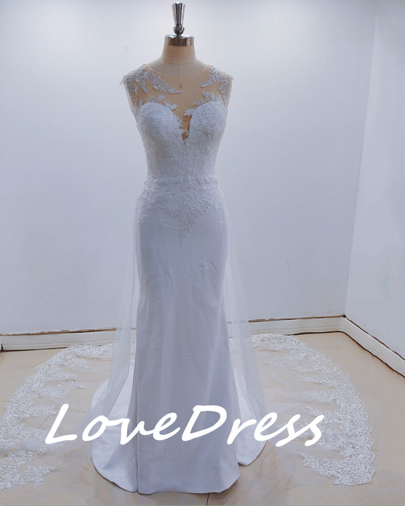 See-through back mermaid wedding dress with lace appliques, sleeveless design, perfect for brides by The Clothing Company Sydney.