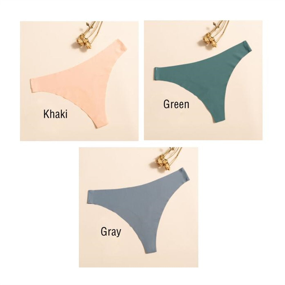Three-pack of seamless, ultra-thin women's G-string panties by The Clothing Company Sydney in solid colors, comfortable lingerie undergarments.