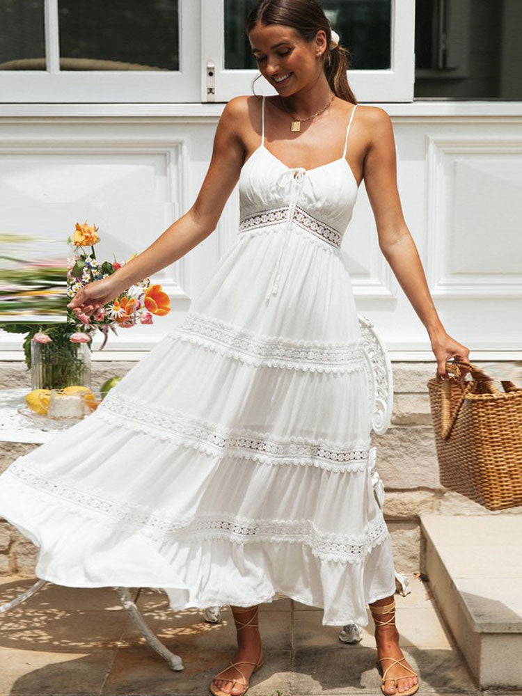 White spaghetti straps summer dress by The Clothing Company Sydney featuring hollow out design, soft fabric, and split hem.