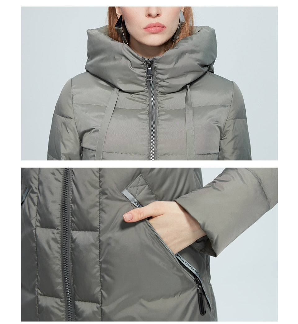 Women's winter jacket by The Clothing Company Sydney featuring a stand collar, hood, large pockets, windproof mid-length coat