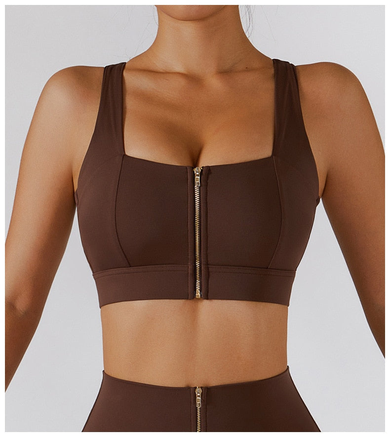 Two-piece women's yoga fitness set with high waist leggings, skirt, and sports bra from The Clothing Company Sydney.