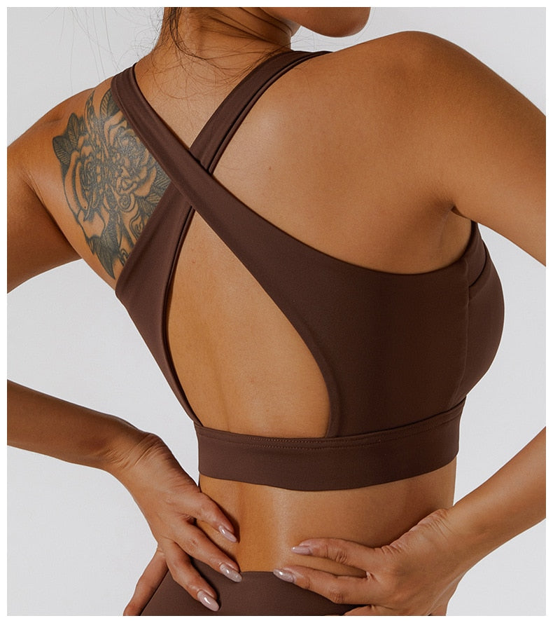 Women's yoga fitness set by The Clothing Company Sydney with high waist leggings, a skirt, and a zipper sports bra.
