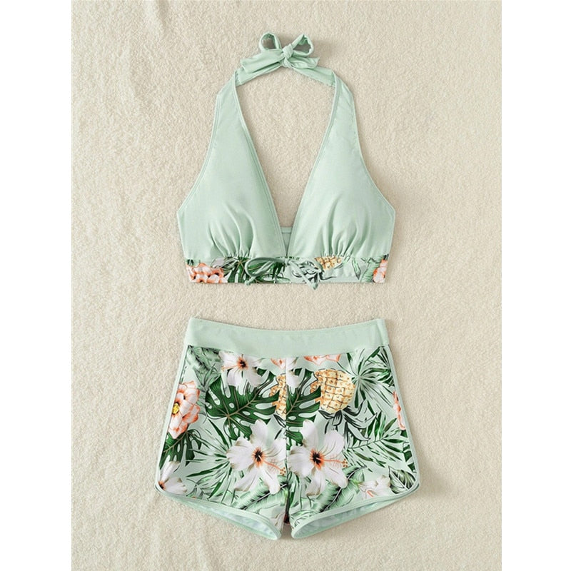 Two-piece swimsuit bikini top with lace print, high waist, deep V-neck, halter, and backless push-up design from The Clothing Company Sydney.