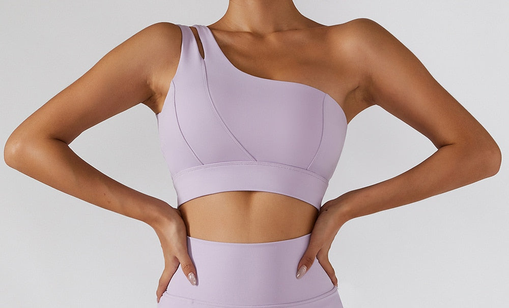 Two-piece women's yoga set with high-waist leggings, skirt, and sports bra from The Clothing Company Sydney for gym and workout fitness.