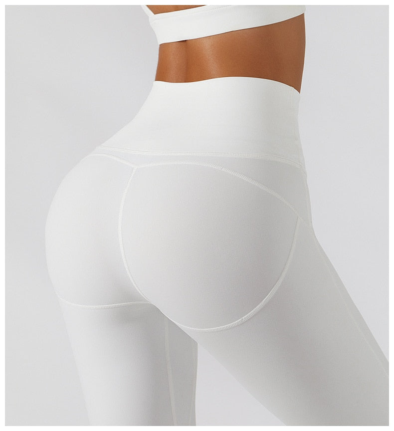 Women's yoga set with high waist leggings, skirt, and sports bra from The Clothing Company Sydney for gym and fitness workouts.