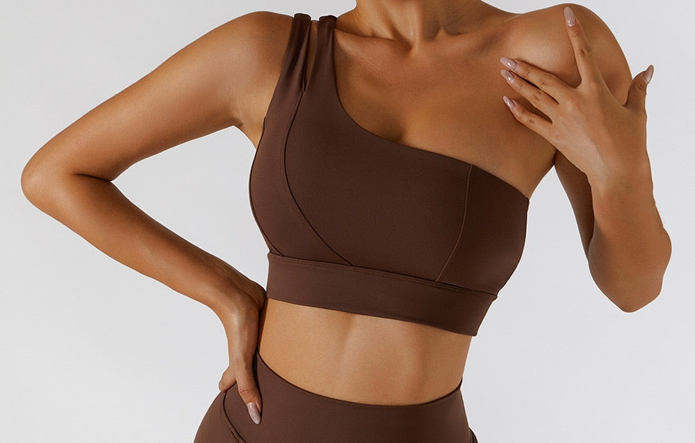 Women's yoga set with high waist leggings, skirt, and sports bra by The Clothing Company Sydney, perfect for gym and fitness workouts.