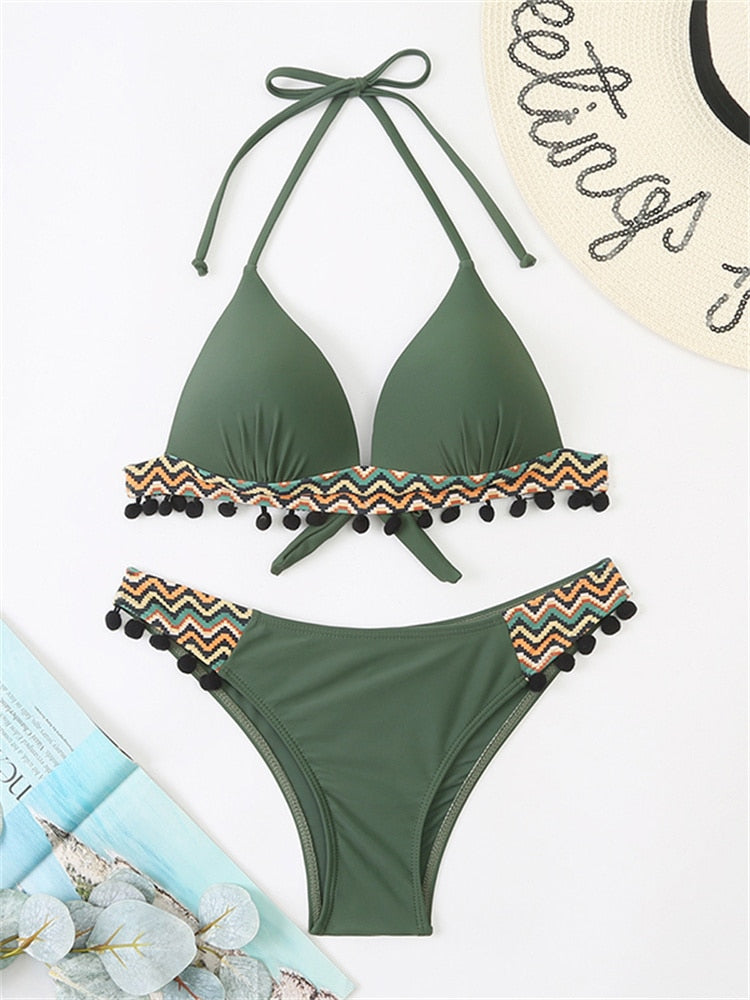 Black leopard print bikini set with tassel accents, push-up design, and Brazilian style swimwear for summer beachwear.