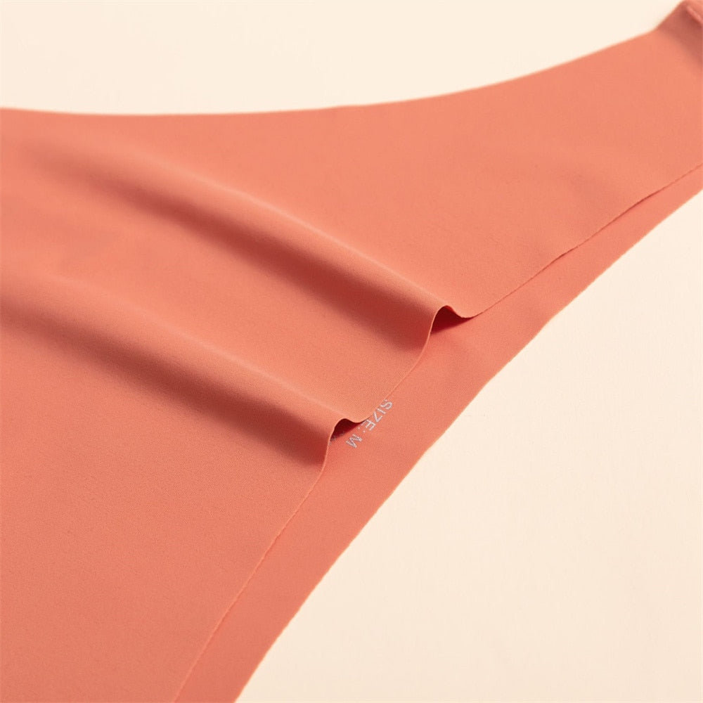 Three pairs of ultra-thin, seamless solid color g-string thong panties for ladies from The Clothing Company Sydney.