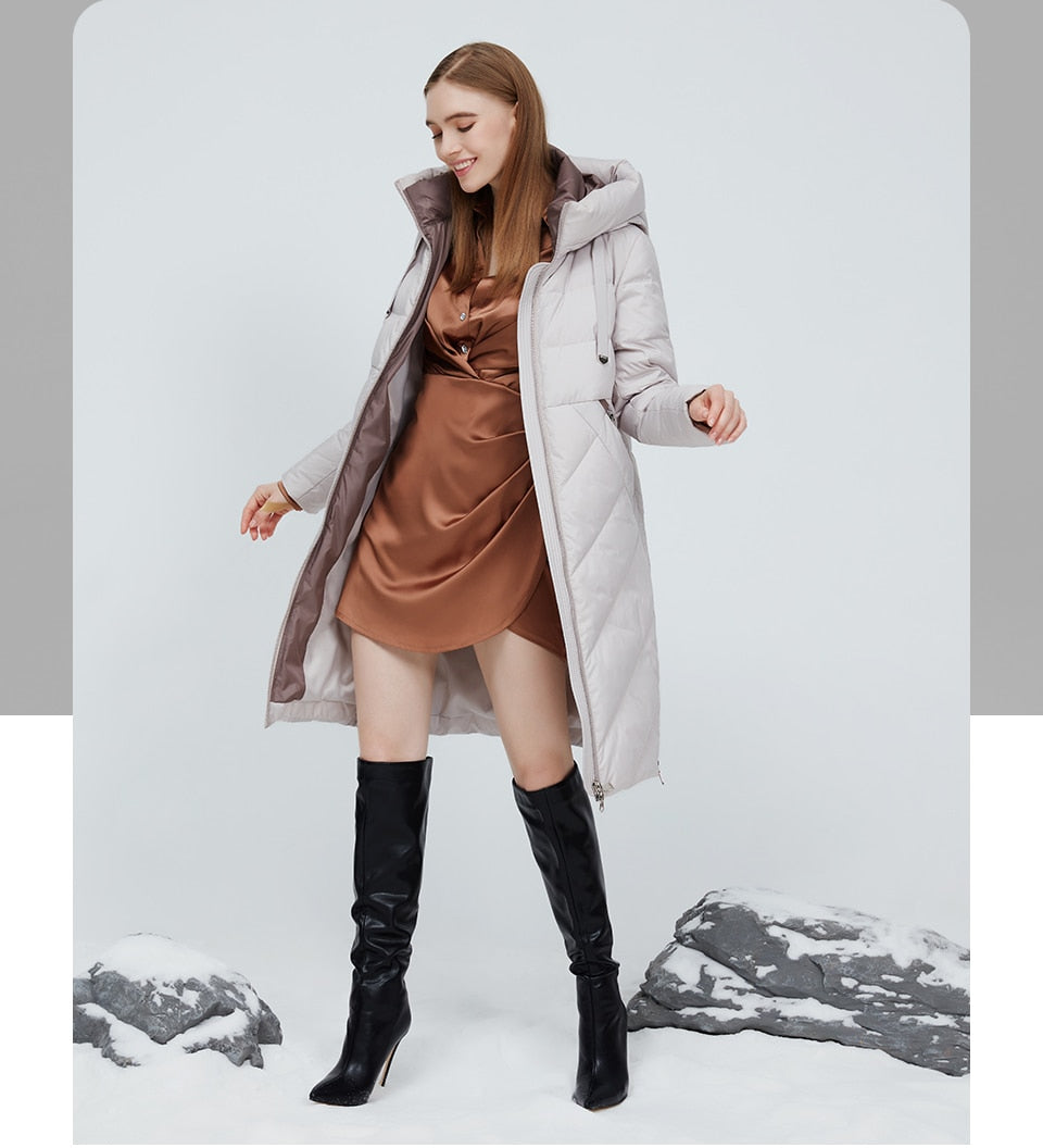 Winter women's long cotton jacket with stand collar, hood, zipper, and pockets, windproof and warm from The Clothing Company Sydney.