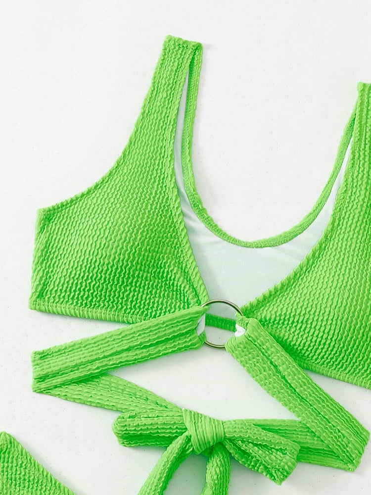 Metal ring textured bikini swimsuit by The Clothing Company Sydney, featuring a push-up design and bandage style for beachwear.