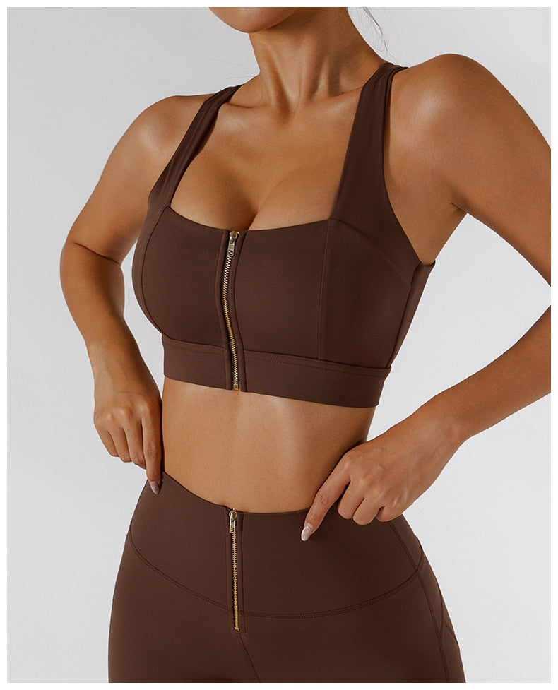 Women's yoga set by The Clothing Company Sydney featuring high waist leggings, a skirt, and a sports bra for gym workouts.
