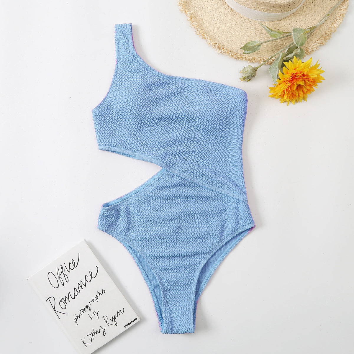 One-piece swimsuit by The Clothing Company Sydney featuring a one-shoulder design, solid color, ribbed fabric, and beach-ready style.