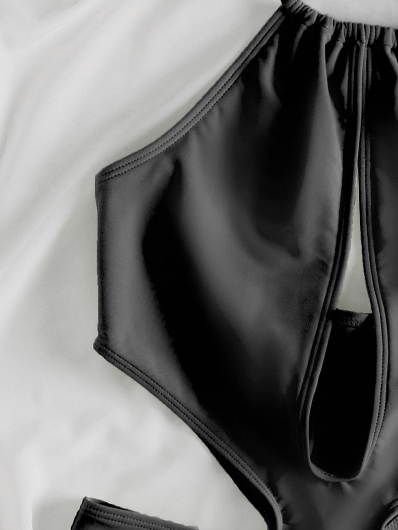 Women’s high waist halter one-piece swimsuit with hollow design and push-up features, by The Clothing Company Sydney.