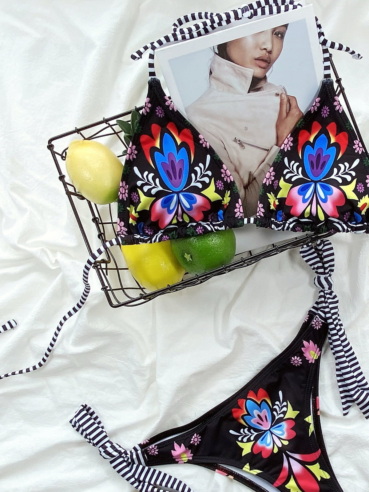 Floral print 2-piece bikini swimwear by The Clothing Company Sydney with push-up cups and lace-up back for beachwear.