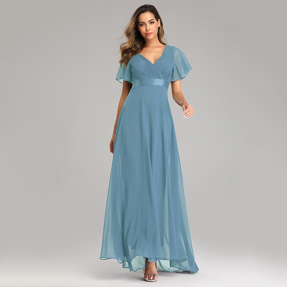 Elegant V-neck chiffon wedding gown with ruffles from The Clothing Company Sydney, perfect for formal events and wedding parties.