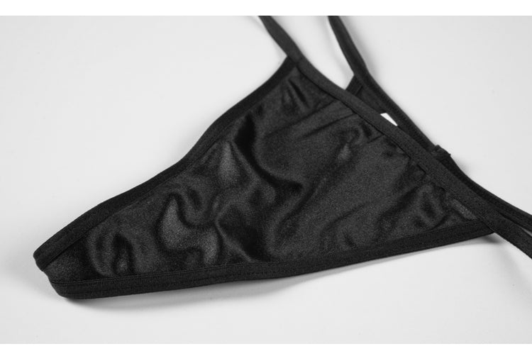 Strappy lingerie set featuring a push-up corset, shapewear bra, G-string, and matching underwear from The Clothing Company Sydney.