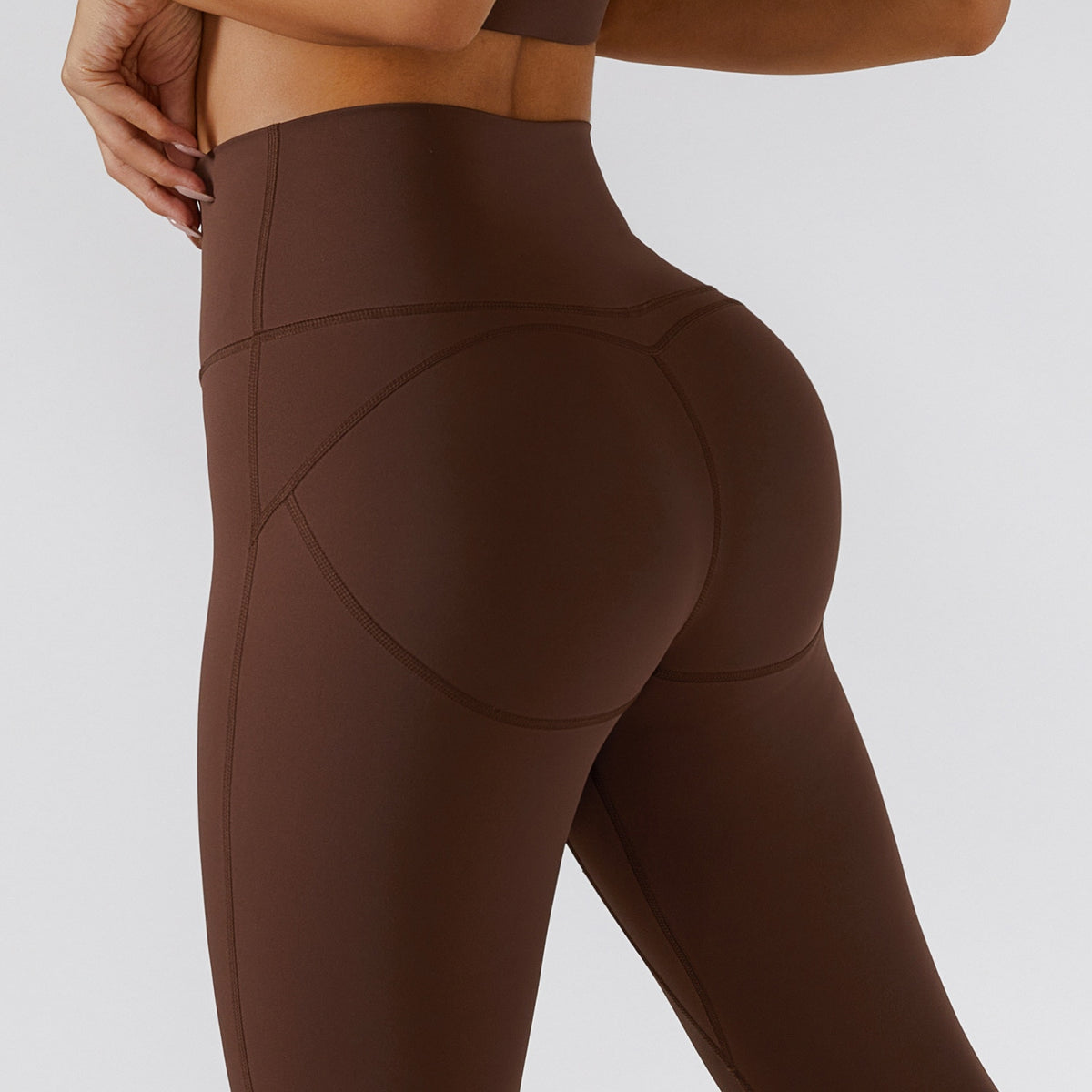 Women's yoga set with high waist leggings, skirt, and sports bra by The Clothing Company Sydney, ideal for gym and workout.
