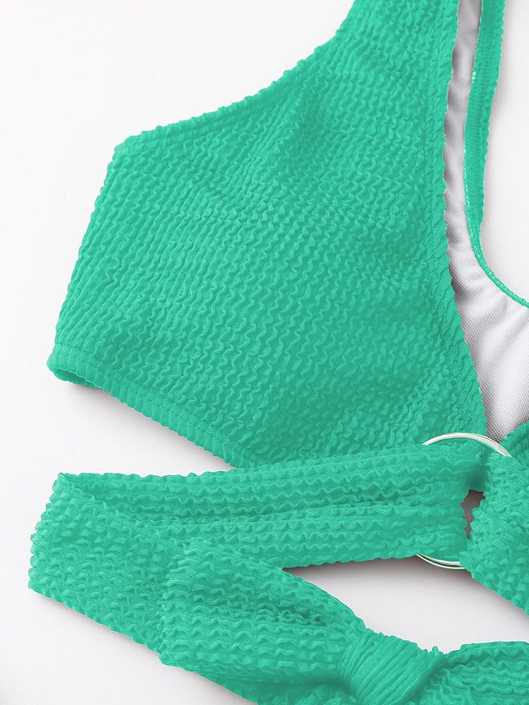 Metal ring textured bikini swimsuit from The Clothing Company Sydney with push-up style, bandage design, and beachwear appeal.