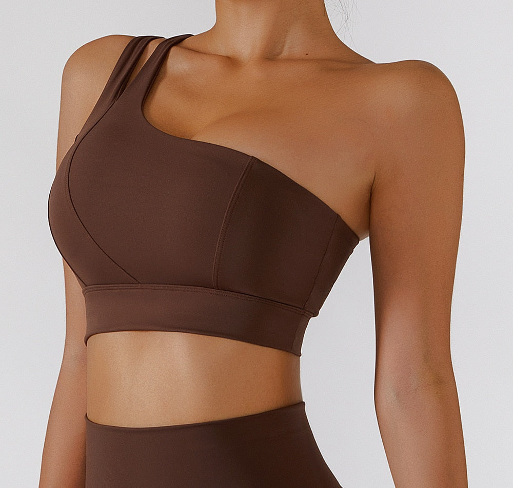 Women's yoga set with high waist leggings, skirt, and sports bra from The Clothing Company Sydney, designed for gym and workout fitness.