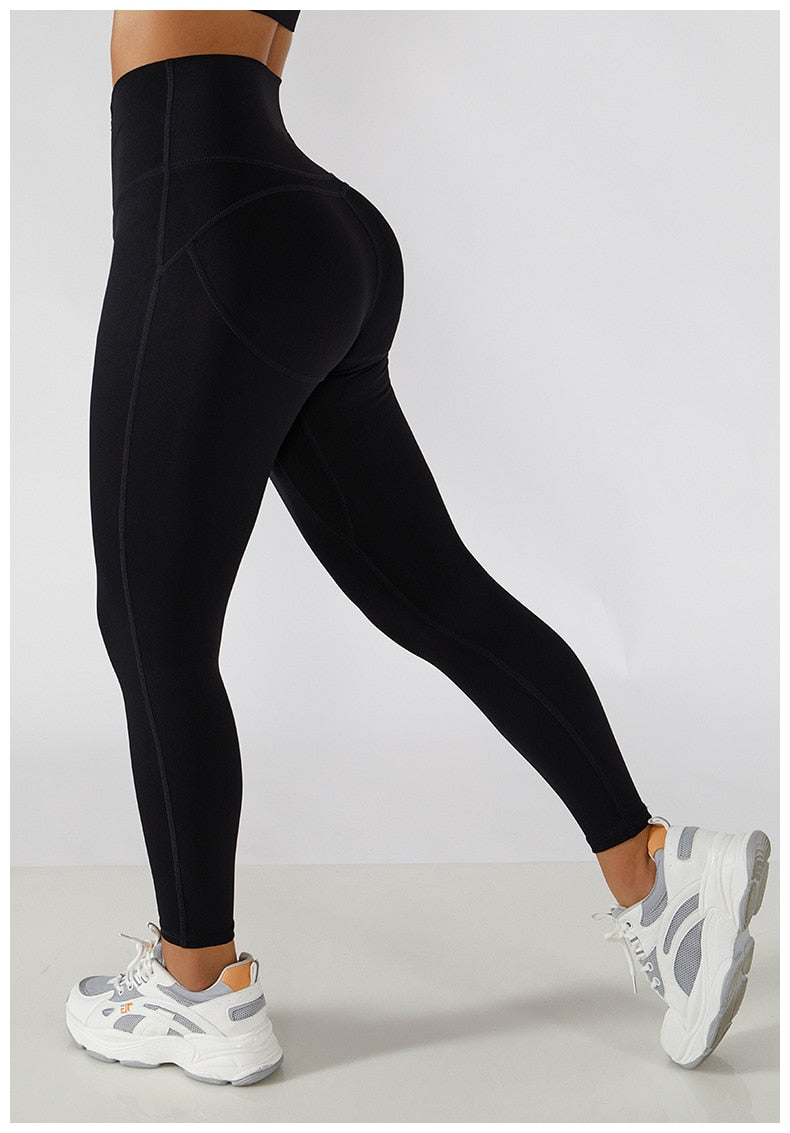 Women's yoga set with high waist leggings, skirt, and sports bra by The Clothing Company Sydney, ideal for gym and workout fitness.