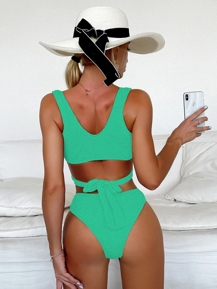 Metal ring textured bikini swimsuit by The Clothing Company Sydney featuring push-up design and bandage style for beachwear.