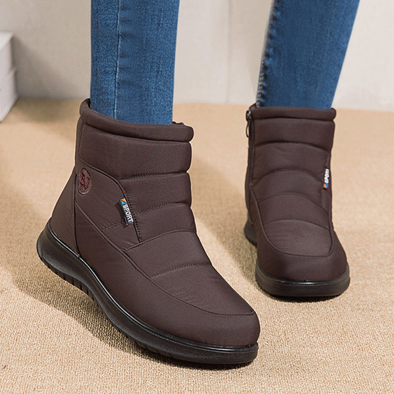 Thick plush winter waterproof snow boots for women by The Clothing Company Sydney, with non-slip soles, flat heels, and warm cotton padding.