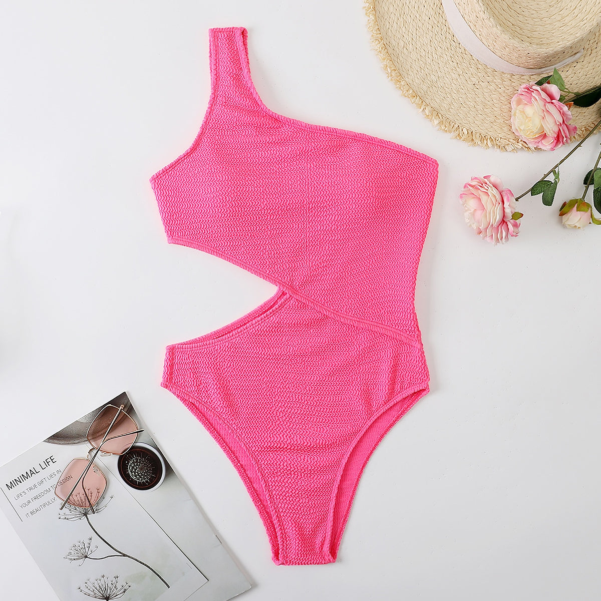 One-piece swimsuit by The Clothing Company Sydney featuring a one-shoulder design, solid color, ribbed fabric, and monokini style.
