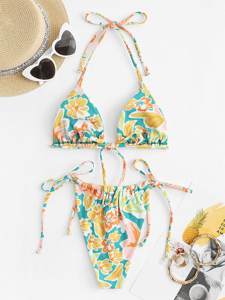 Ribbed flower print tie side bikini set by The Clothing Company Sydney, low waist, padded two-piece swimwear on a model.
