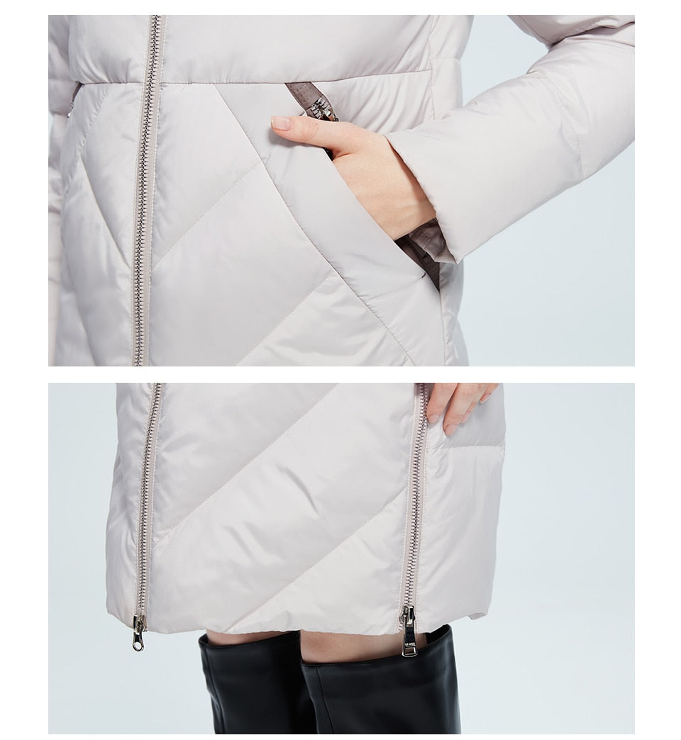 Winter women's long cotton jacket by The Clothing Company Sydney with stand collar, hood, zip closure, pockets, and windproof design.