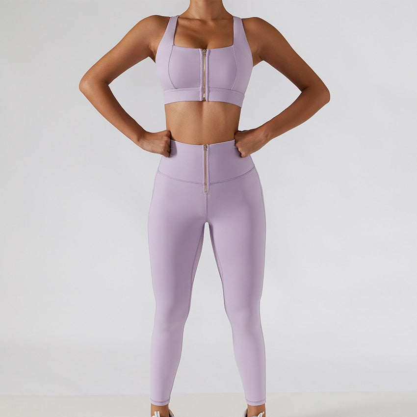 Two-piece women's yoga set with high waist leggings, skirt overlay, and sports bra from The Clothing Company Sydney.