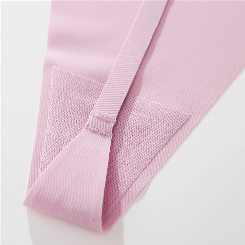 Three seamless women G-string panties from The Clothing Company Sydney, featuring adjustable straps and ice silk lingerie fabric.