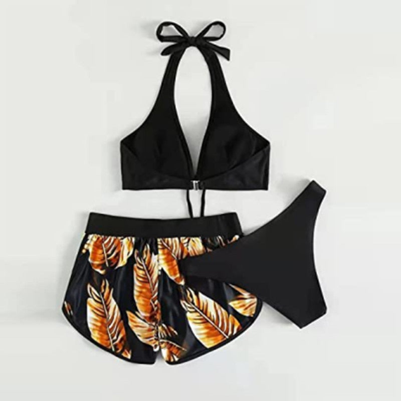 Two-piece swimsuit bikini set with lace print, high waist, halter neck, deep V-neck, and backless design by The Clothing Company Sydney