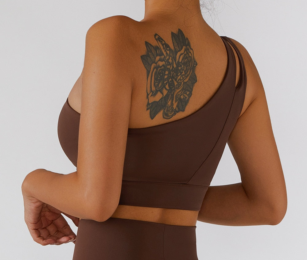 Women's yoga set with high waist leggings, skirt, and sports bra from The Clothing Company Sydney, designed for gym and fitness workouts.