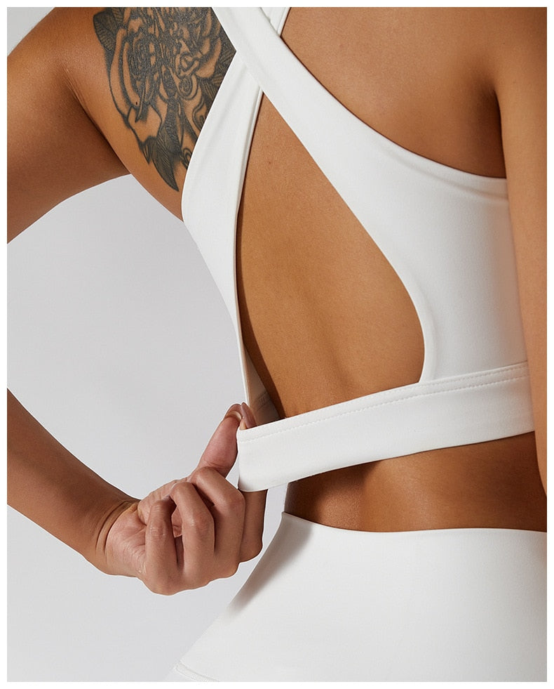 Women's yoga set with high waist leggings, skirt, and sports bra by The Clothing Company Sydney, perfect for gym and fitness workouts.