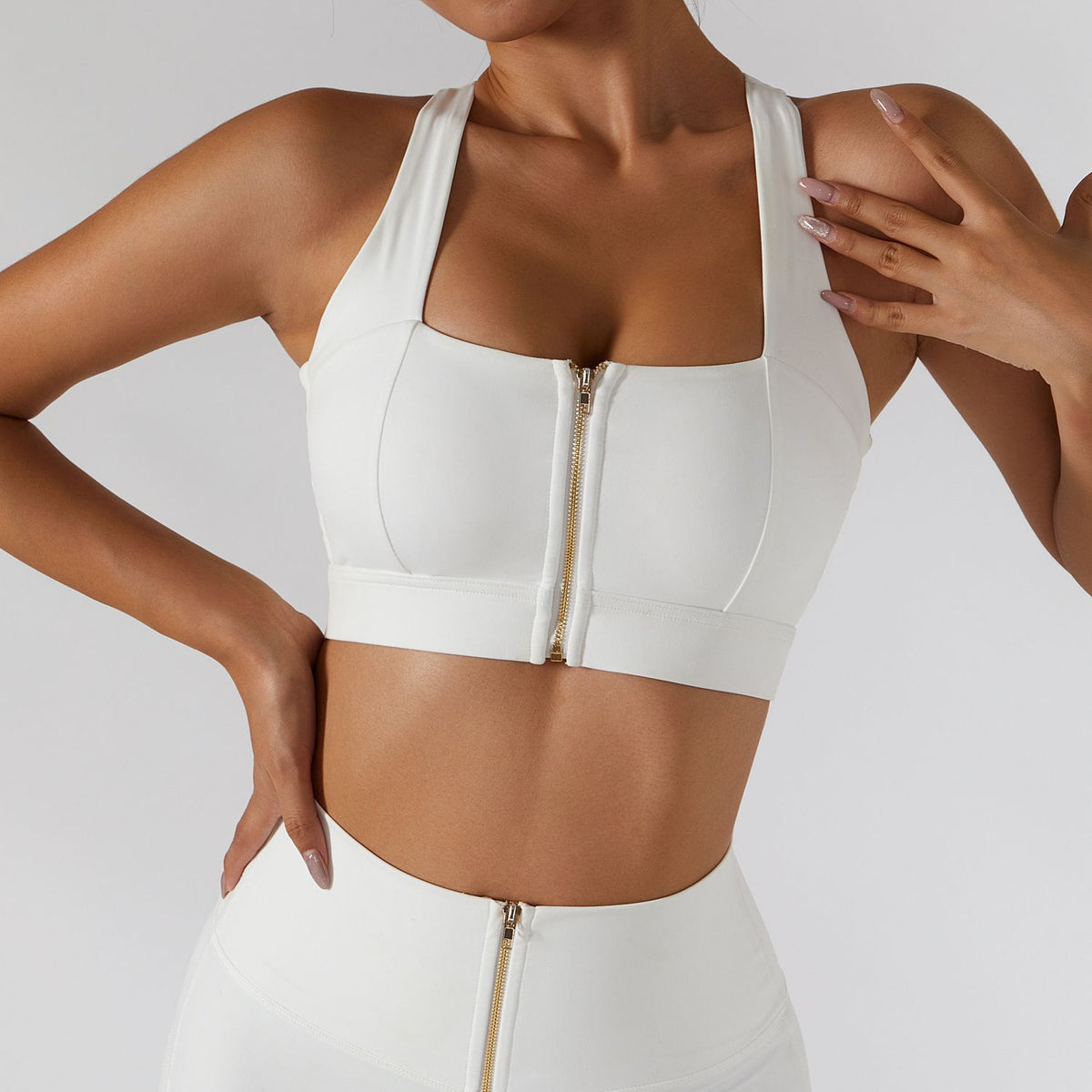 Women's yoga set with high waist leggings, skirt, and sports bra from The Clothing Company Sydney, ideal for gym and workout fitness.