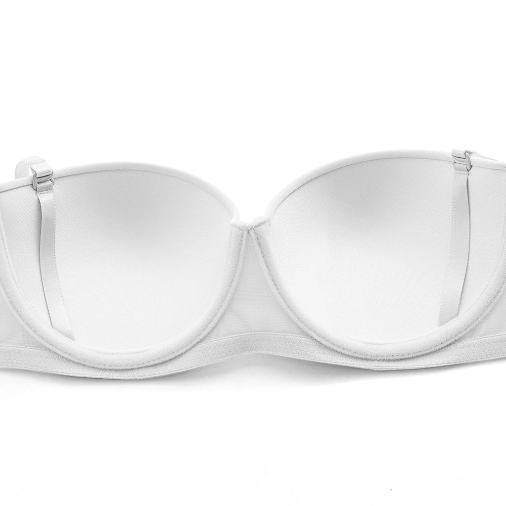 Seamless strapless bra from The Clothing Company Sydney with 1/2 cup design, invisible under clothing, with detachable shoulder straps.