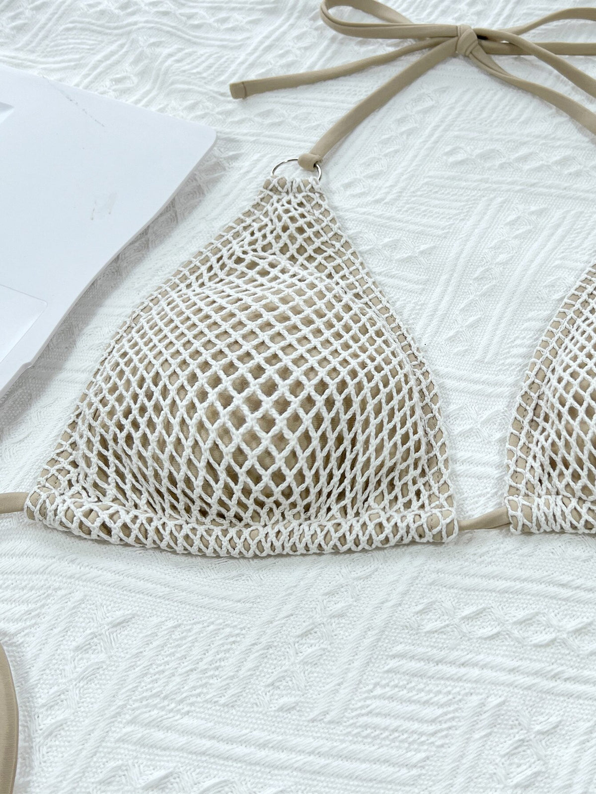 Stylish 2-piece fishing net micro bikini swimsuit with padded halter top, solid color, Brazilian monokini beachwear by The Clothing Company Sydney
