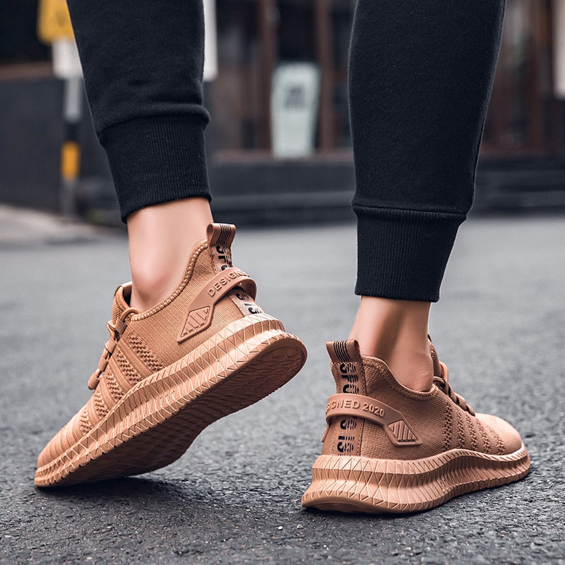 Men's casual running sneakers with breathable mesh, lightweight design, and comfort sole from The Clothing Company Sydney.