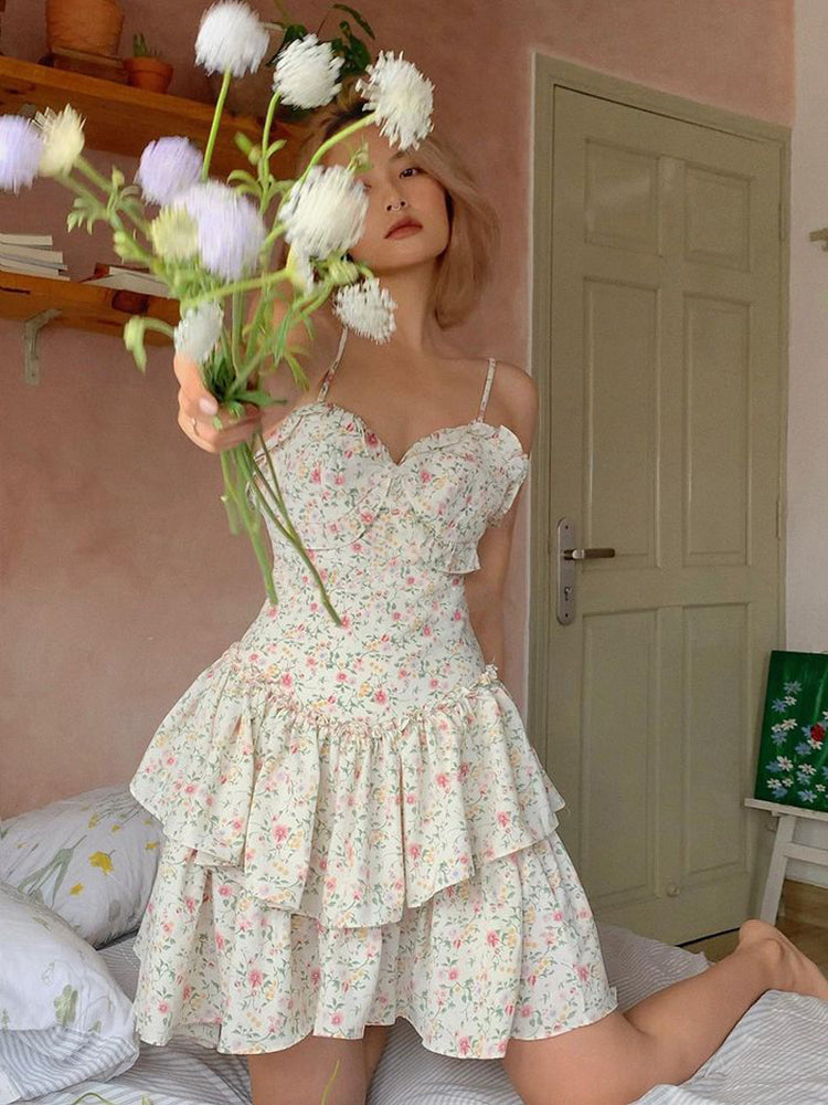 French romantic floral print summer dress by The Clothing Company Sydney featuring ruffles, pleats, and a double-layer mini design.