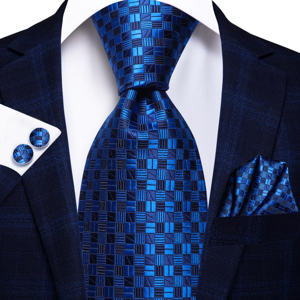 Blue silk business tie with dots, plaid design, and matching cufflinks, perfect for weddings or professional attire.