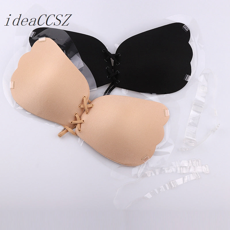 Invisible silicone push-up bra with transparent straps, backless design, and reusable bralette for wedding or special occasions.