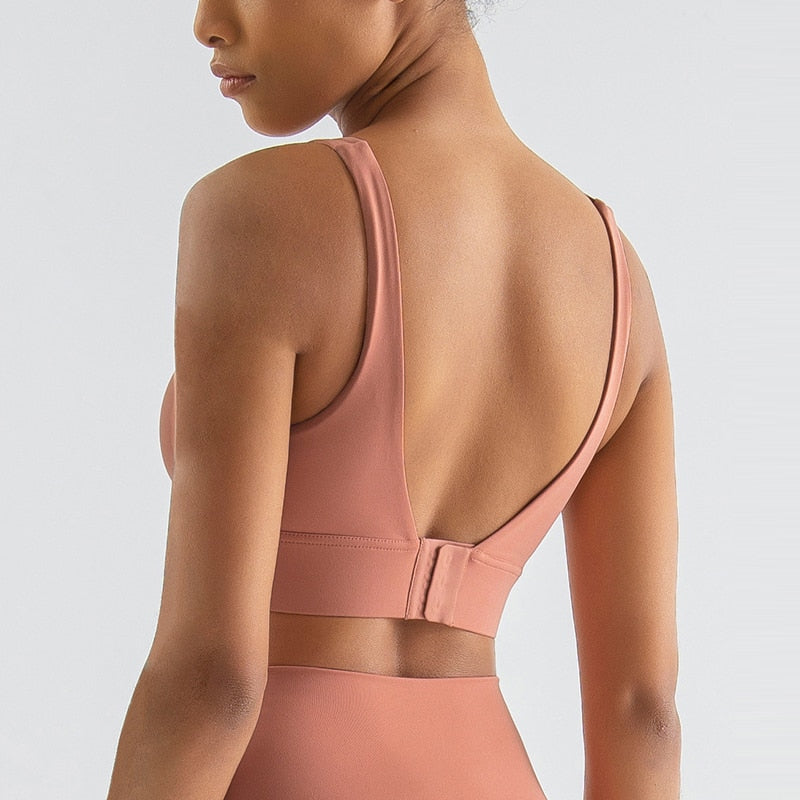 Women's fitness sports bra by The Clothing Company Sydney with fixed chest pads, supportive crop top for yoga and workout activities.