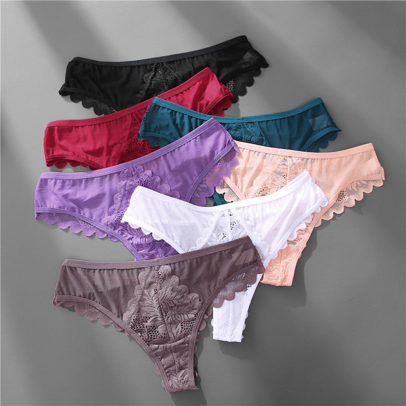 Three lace G-string panties from The Clothing Company Sydney, soft lingerie with delicate lace details and minimal coverage.