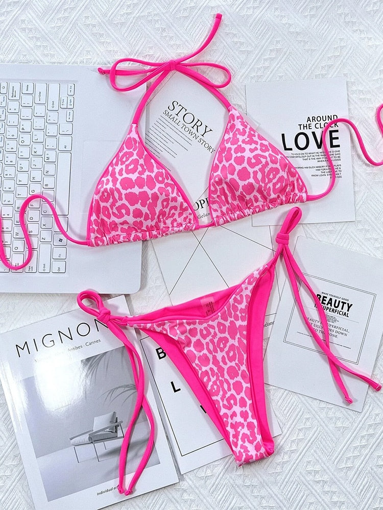 Leopard print bikini swimsuit from The Clothing Company Sydney with halter top and Brazilian cut for beachwear.