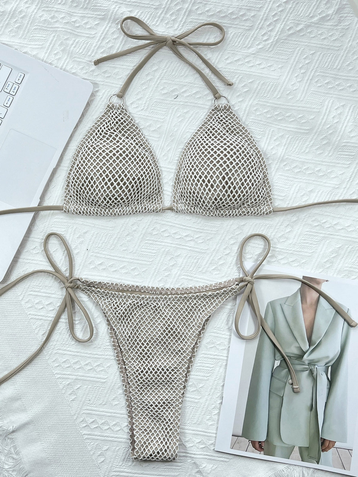 Stylish 2-piece fishing net micro bikini from The Clothing Company Sydney, featuring a solid padded halter swimsuit for beachwear.