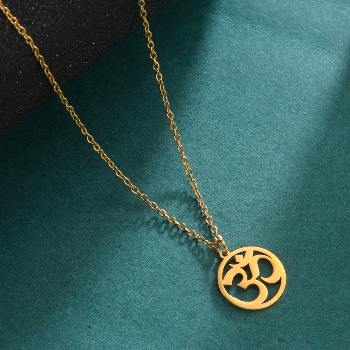 Stainless steel Tamil Om Aum symbol with trident pendant necklace featuring Om Shiva symbol, vintage yoga-inspired jewelry.
