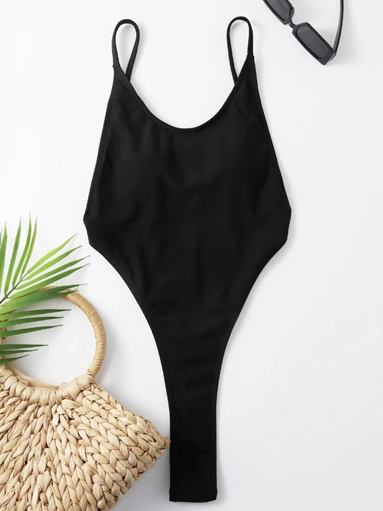 Backless high-leg one-piece swimsuit by The Clothing Company Sydney, featuring a thong cut and Brazilian-style monokini for women.