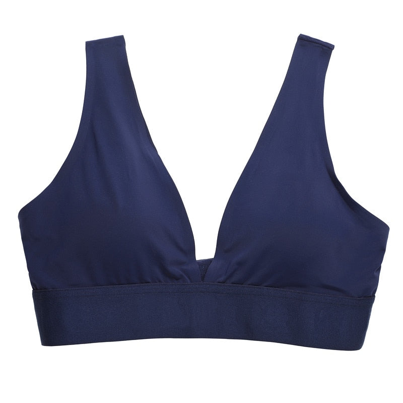 Seamless plunge sports bra by The Clothing Company Sydney featuring push-up padding, deep V neckline, and bralette style lingerie.