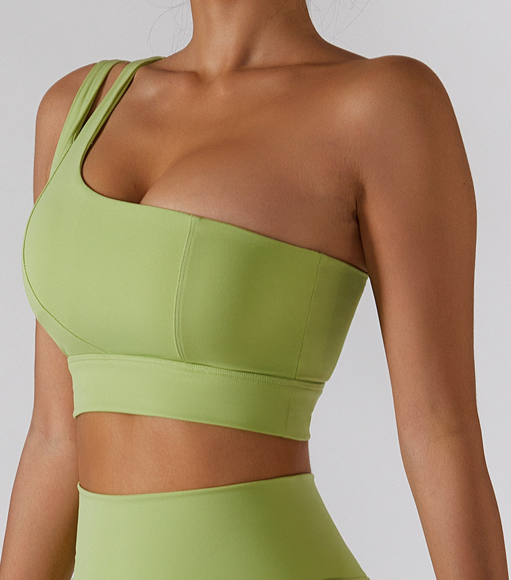 Women's yoga set with high waist leggings, skirt, and zip sports bra from The Clothing Company Sydney, perfect for gym workouts.
