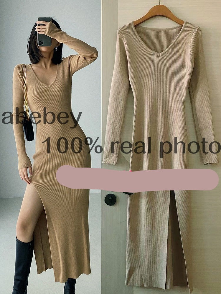 Slim fitting long sleeve slit sweater dress by The Clothing Company Sydney, over-the-knee knit dress with a stylish slit detail.